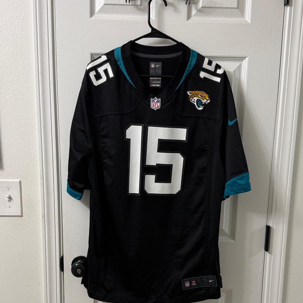 Nike Black and Teal Sports Jersey